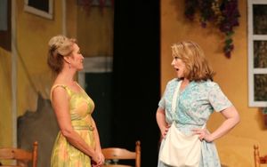 Stephanie Rhoads is Floria, an Italian innkeeper who teaches a few lessons to Emily S Photo