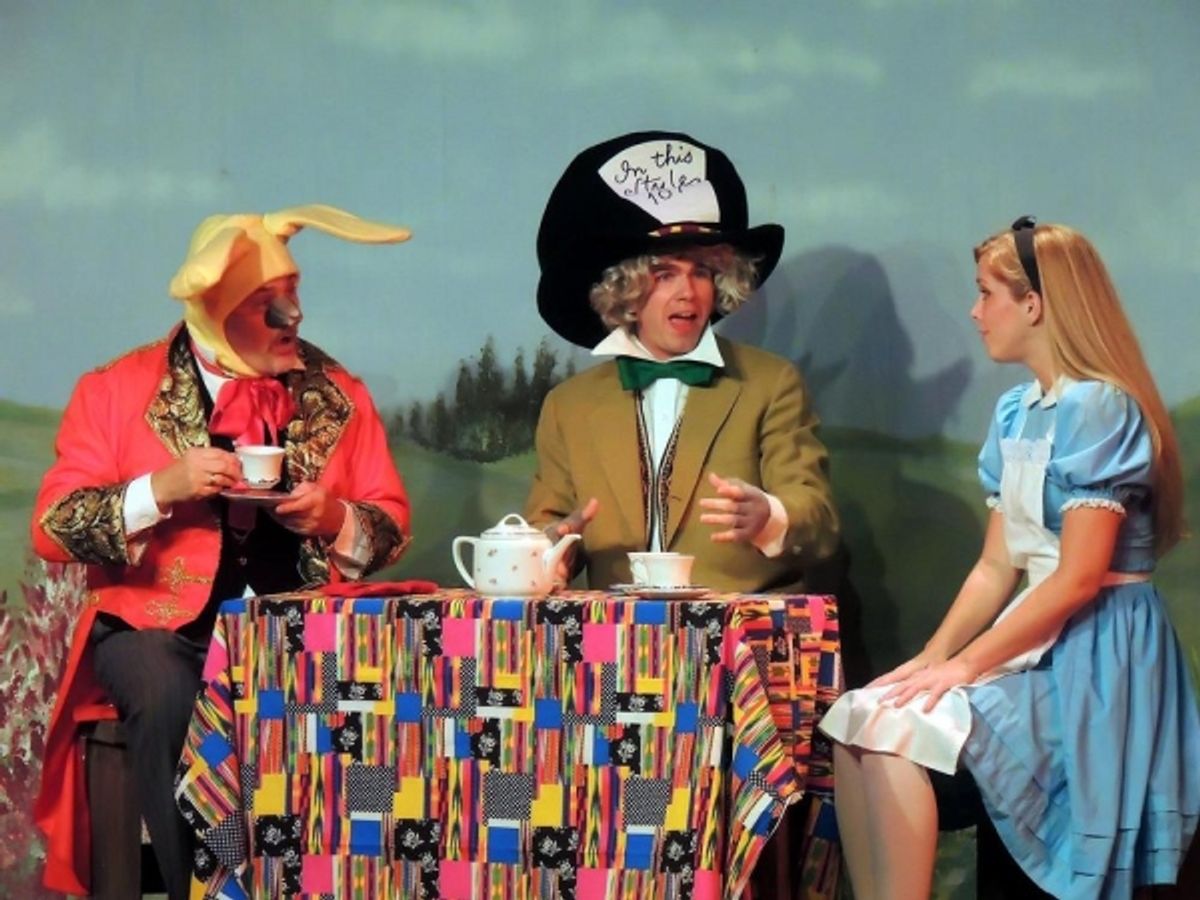 Bill Kiska as the March Hare, Matt Rothenberg as the Mad Hatter, and Mary Ellen Cameron as Alice at 
