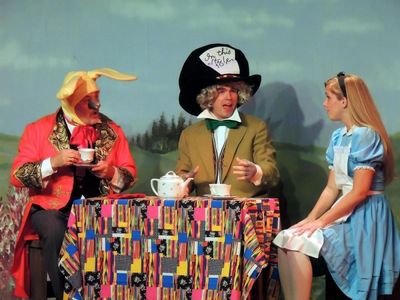 Bill Kiska as the March Hare, Matt Rothenberg as the Mad Hatter, and Mary Ellen Camer Photo