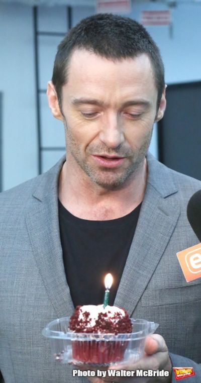 Extra offers Hugh Jackman a birthday cupcake at the meet & greet for ''The River''  a Photo