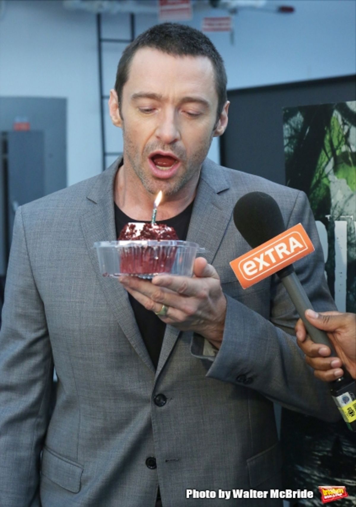 Extra offers Hugh Jackman a birthday cupcake at the meet & greet for ''The River''  at their rehearsal studio on October 14, 2014 in New York City.  at 