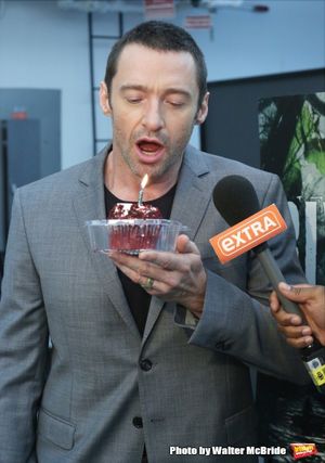 Extra offers Hugh Jackman a birthday cupcake at the meet & greet for ''The River''  a Photo