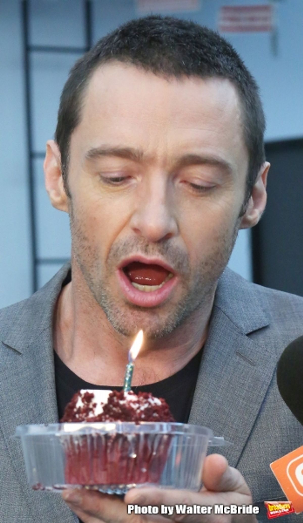 Extra offers Hugh Jackman a birthday cupcake at the meet & greet for ''The River''  at their rehearsal studio on October 14, 2014 in New York City.  at 