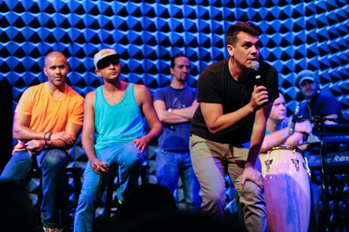 Anthony Veneziale, right, performs as Christopher Jackson, Utkarsh Ambudkar and Lin-Manuel Miranda look on in the background, at Pivot''s Freestyle Love Supreme premiere event at Joe''s Pub, on Monday, Oct. 13, 2014 in New York. (Photo by Evan Agostini/In at 