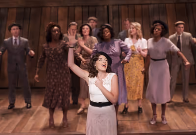 Mary Kate Morrissey (Sharon Falconer) and the cast of ELMER GANTRY Photo