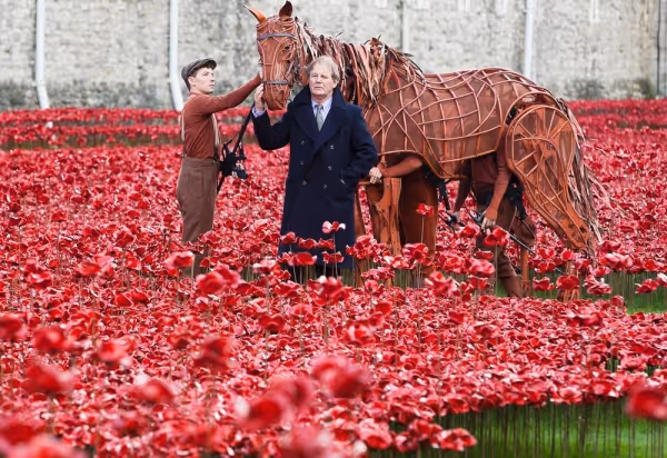 Joey, star of WAR HORSE, and author Michael Morpourgo at the Tower of London Photo