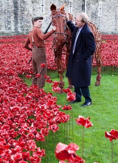 Joey, star of WAR HORSE, and author Michael Morpourgo at the Tower of London Photo