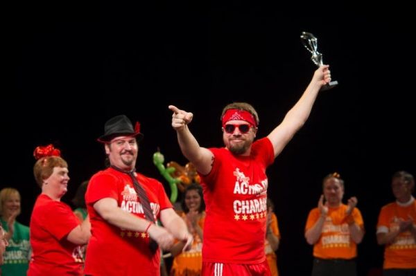 Charades Champion''s Remarkable Reds team members Kelly Jackson, Bruce Warren, Jamie  Photo