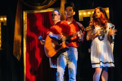 J. Elijah Cho (with guitar) is both music director and live accompanist for the music Photo