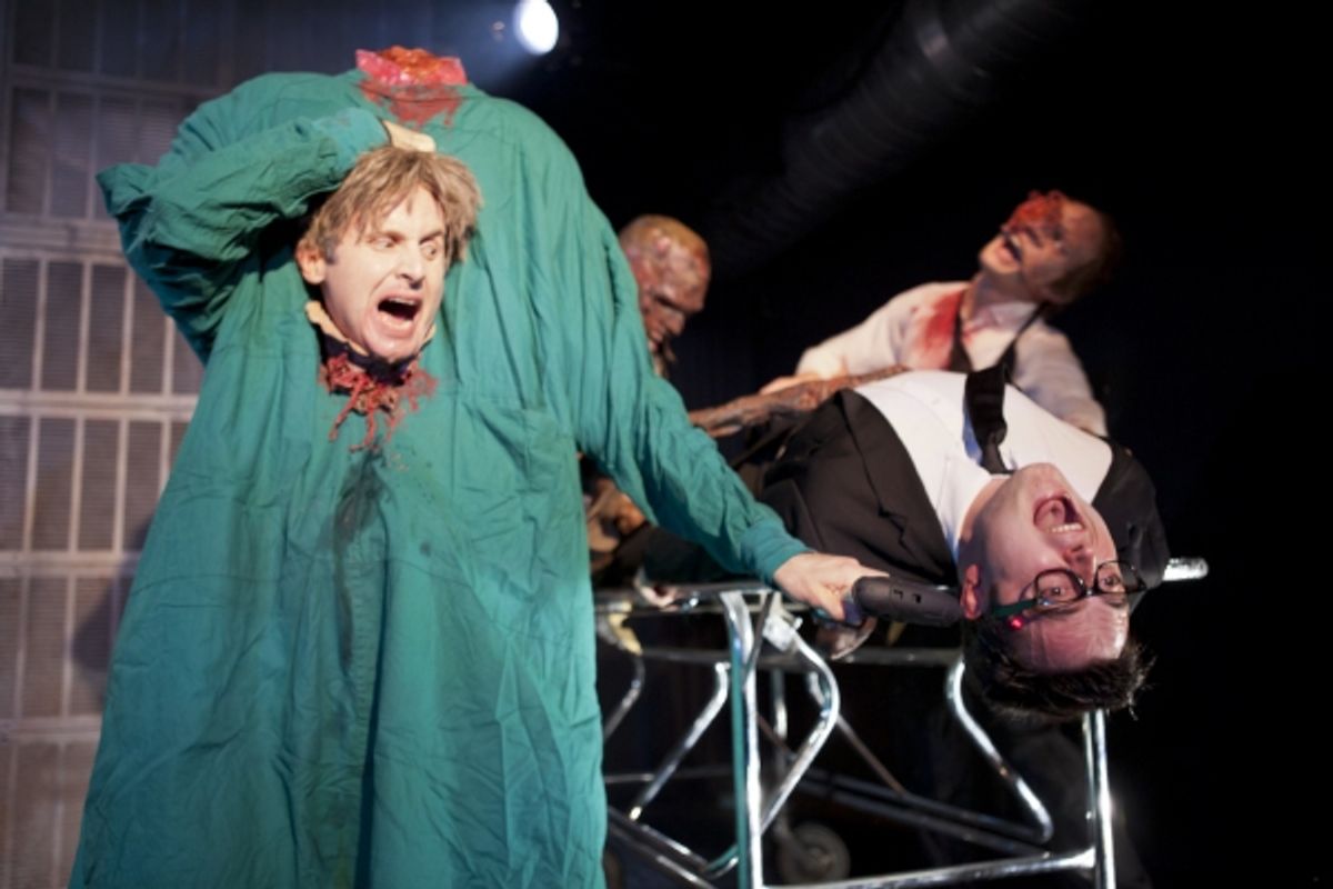 HerBert West (Graham Skipper, on table) is surrounded by monstrosities of his own making. at 