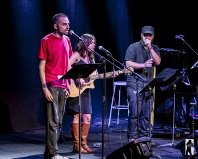Aaron Jafferis, Rebecca Hart and Yako 440 performing a song they wrote for their show Photo