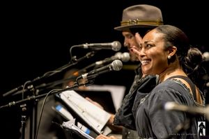 Natalie Venetia Belcon (with Brandon O’Neill in the background) in BEAUTIFUL POISON @ BroadwayWorld Natalie Venetia Belcon (with Brandon O’Neill in the background) in B Photo