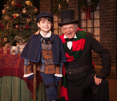 Thomas D. Mahard (Ebeneezer Scrooge) with Mason Podhorsky (one of our two Tiny Tim Cr Photo