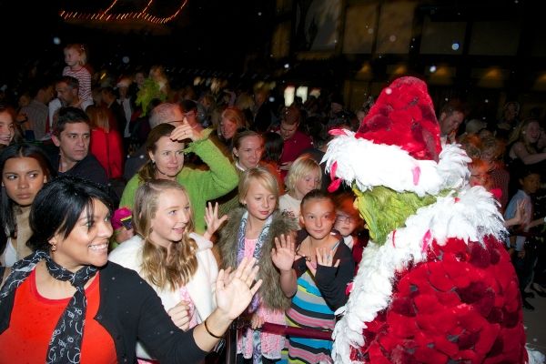 The Grinch (Burke Moses) greets audience members Photo