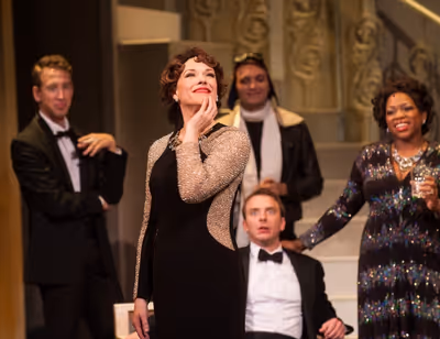 Emily Skinner and the company of MAME Photo