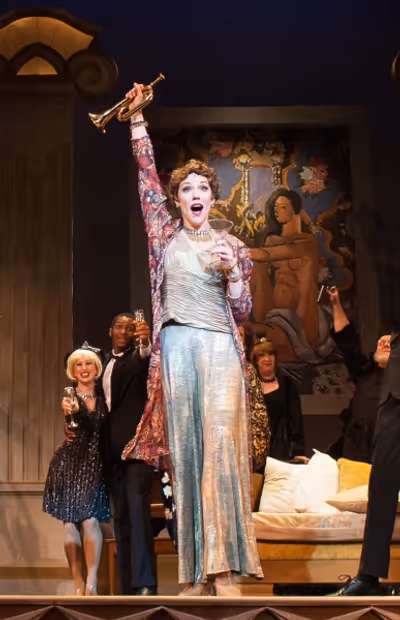 Emily Skinner and the company of MAME Photo