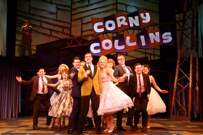Kyle Anderson (center, as Corny Collins) and the Council Kids Photo