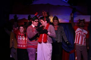 Rudolph (Grant Drager) learns a musical lesson the hard way in Hell in a Handbag''s R Photo
