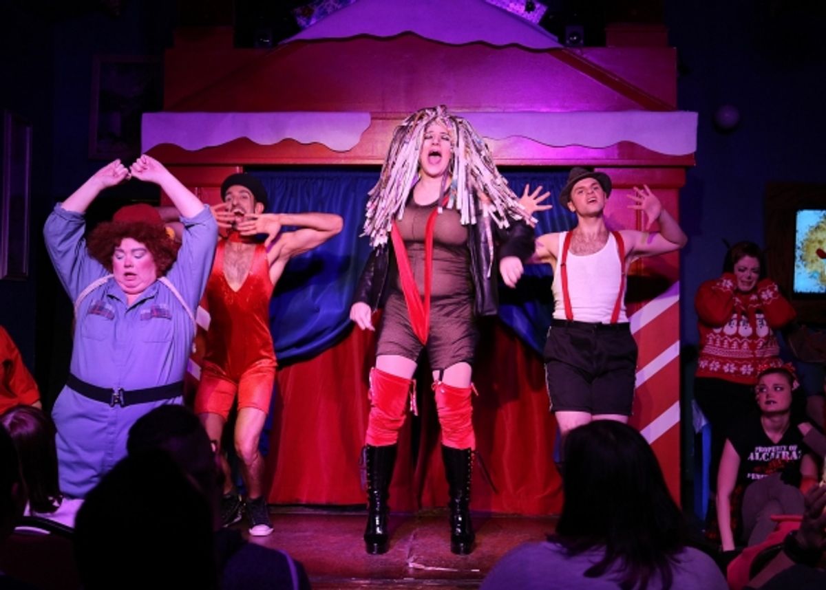 The Abominable Dragbeast (Ed Jones) forces her captors to watch Cher productions number as YukonCornelia (left - Lori Lee) dances along. at 