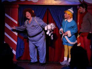 Yukon Cornelia (Lori Lee), the odd prospector with a heart of gold seems to be talking to somebody as Herbie the Elf (Chad) and Rudolph (Grant Drager) look on in confusion. @ BroadwayWorld Yukon Cornelia (Lori Lee), the odd prospector with a heart of gold seems to be talkin Photo