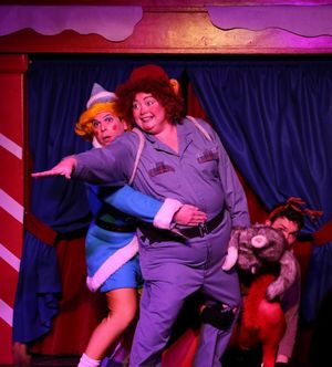Herbie (Chad) holds on to Yukon Cornelia (Lori Lee) for dear life as Rudolph (Grant D Photo