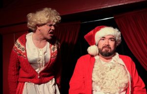 All is not merry at the Claus home as Mrs. Claus (Ed Jones) tries to talk to an unres Photo
