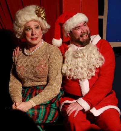 Mrs. Claus (Ed Jones) tries to hold it together long enough to get through a televise Photo