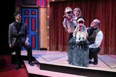 Peter Boyer (Scrooge) observes Tracey Stephens (Want) and Michael Sharp Photo