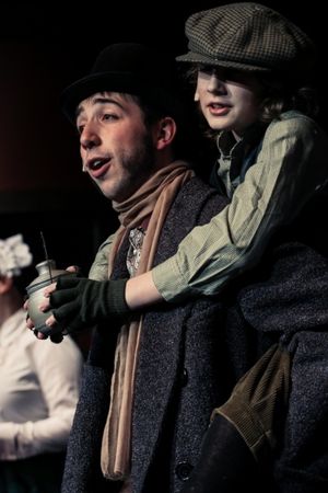 Derek Hall (Bob Cratchit), Harrison Devlin (Tiny Tim) Photo