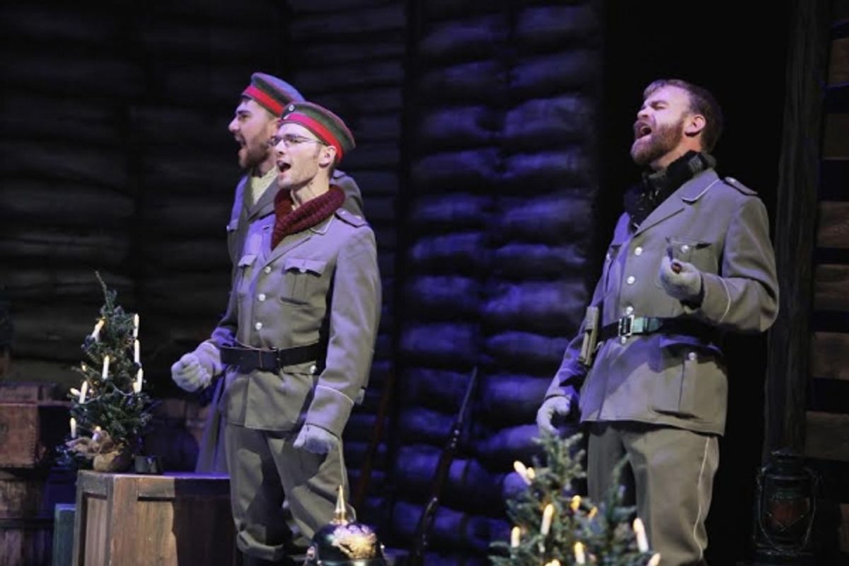 German soldiers sing Christmas carols. Left to right: Patrick McWilliams, Michael Gettinger, Jeffrey K. Miller. (Photo by Mikki Schaffner)
 at 