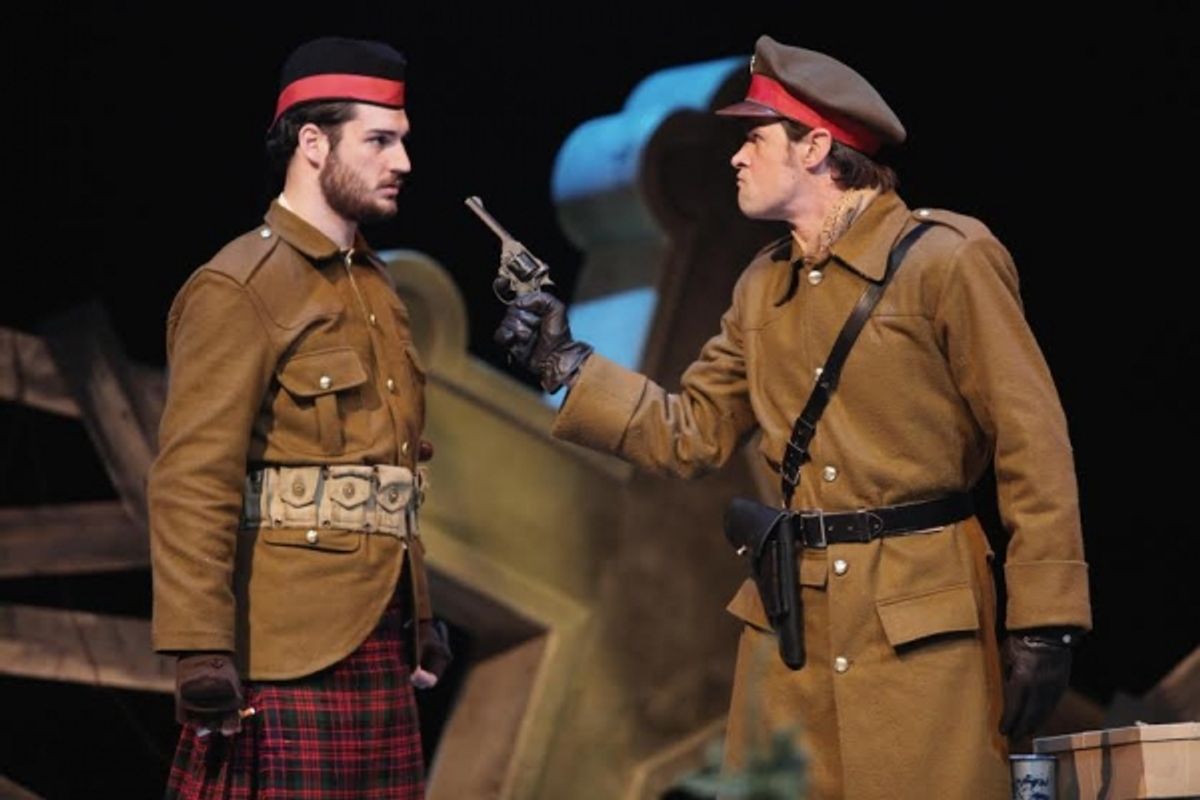 A British lieutenant (Carter Bratton) threatens to shoot a sergeant (Matt Krieg) for fraternizing with the enemy. (Photo by Mikki Schaffner)
 at 