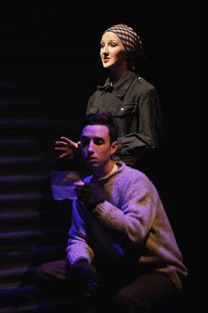 An English soldier (Jack Manion) reads a letter from his fiancÃ©e (Emily Mohler). ( Photo