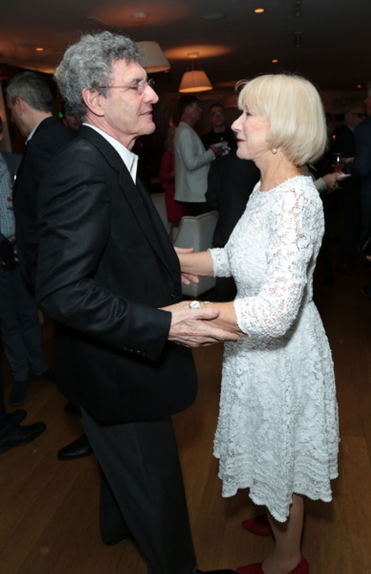 Alan Horn greets Helen Mirren as Disney celebrates their 2015 Golden Globes nominees from Into the Woods, Big Hero 6, and The Hundred-Foot Journey in Los Angeles, California on Saturday, January 10, 2015. (Photo: Alex J. Berliner/ABImages) at 