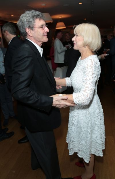 Alan Horn greets Helen Mirren as Disney celebrates their 2015 Golden Globes nominees  Photo