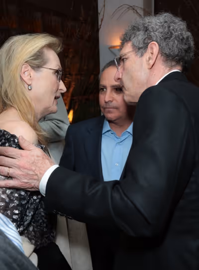 Meryl Streep, Alan Bergman and Alan Horn chat as Disney celebrates the Golden Globes  Photo