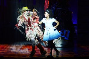 The Scarecrow (David LaMarr, left) and Dorothy (Destinee Rea, right) skip down the yellow brick road @ BroadwayWorld The Scarecrow (David LaMarr, left) and Dorothy (Destinee Rea, right) skip down the ye Photo