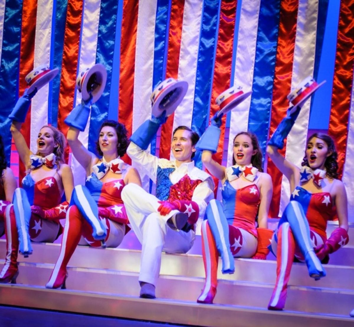 Will Rogers (Marc Fouchi) and the cast of The Will Rogers Follies at 