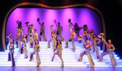 Will Rogers (Marc Fouchi) and the cast of The Will Rogers Follies Photo