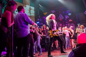 Joel Hoekstra with past and present cast members of ROCK OF AGES Photo