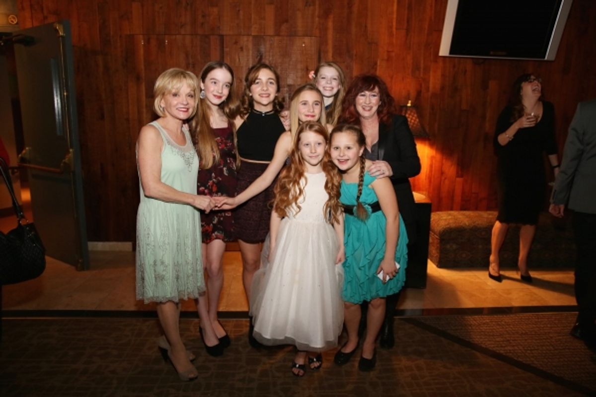 Executive Producer Cathy Rigby (left) and cast member Vicki Lewis (right) pose with the ensemble dancers at 