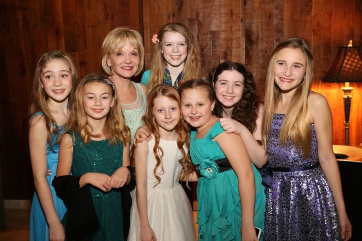 Executive Producer Cathy Rigby poses with the ensemble dancers at 