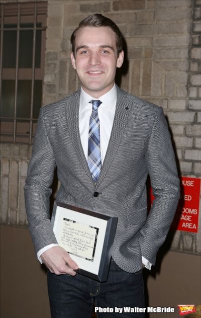 Micah Stock, with his treasured note from Terrence McNally Photo
