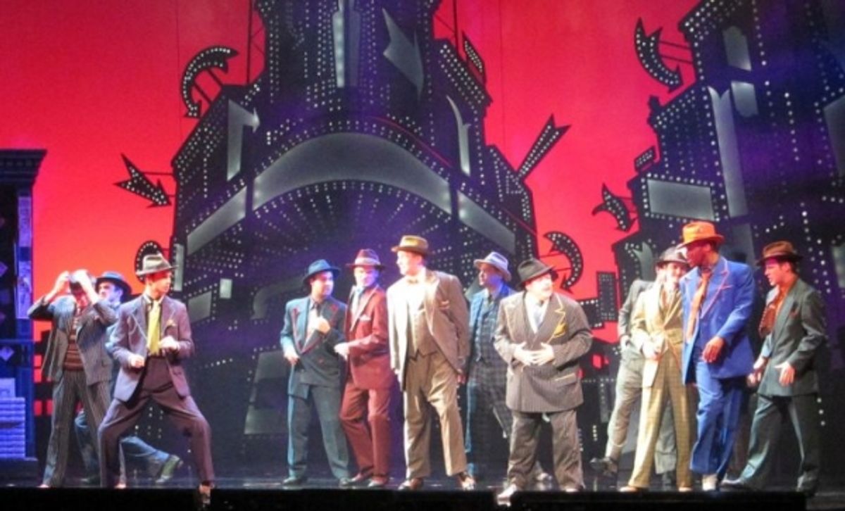 Todd Berkich and the male ensemble of GUYS & DOLLS at 