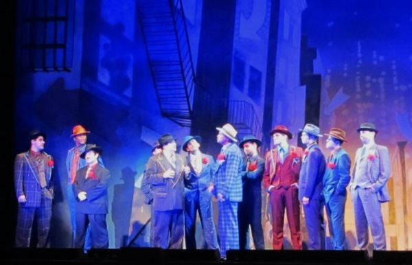 John Galas as Big Jule and the male ensemble Photo