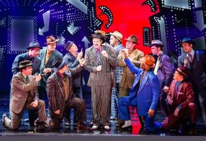 Chris Swan (Nathan) and the male ensemble of GUYS & DOLLS Photo