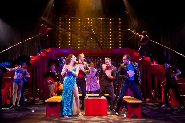 Irina Tsikurishvili as Beatrice and Ben Cunis as Benedick with the ensemble Photo