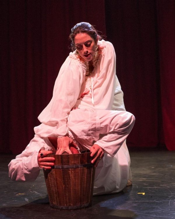 Jeanne Syquia, Karl Herlinger (with his head in the bucket) Photo