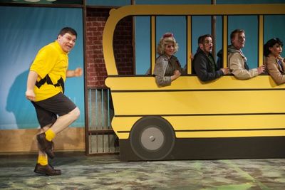 Poor Charlie Brown (L. Zac Schuman) missed the bus again as his friends (Harmony Livi Photo