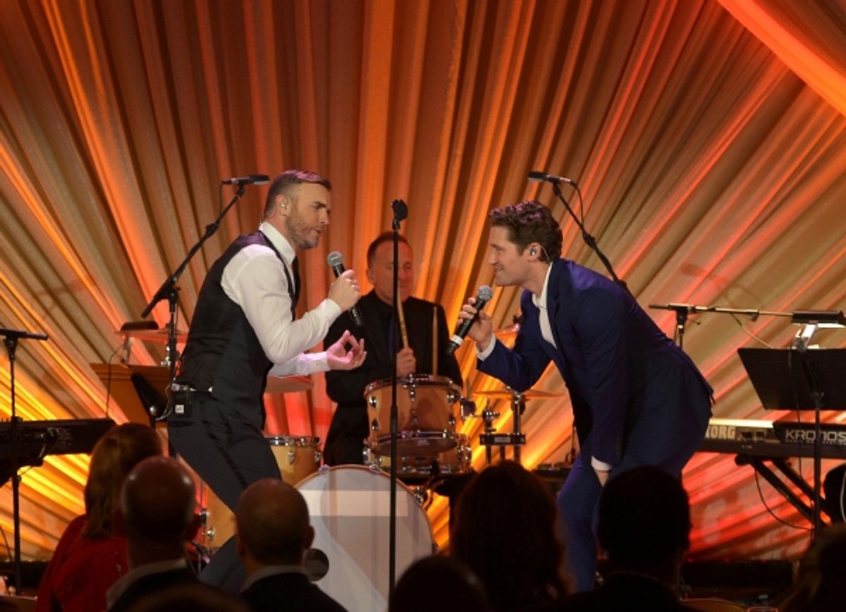 LOS ANGELES, CA - FEBRUARY 21:  Singer Gary Barlow (L) and actor Matthew Morrison perform onstage during The Weinstein Company's Academy Awards Nominees Dinner in partnership with Chopard, DeLeon Tequila, FIJI Water and MAC Cosmetics on February 21, 2015 at 