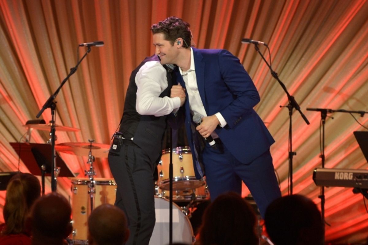 LOS ANGELES, CA - FEBRUARY 21:  Singer Gary Barlow (L) and actor Matthew Morrison perform onstage during The Weinstein Company's Academy Awards Nominees Dinner in partnership with Chopard, DeLeon Tequila, FIJI Water and MAC Cosmetics on February 21, 2015 at 